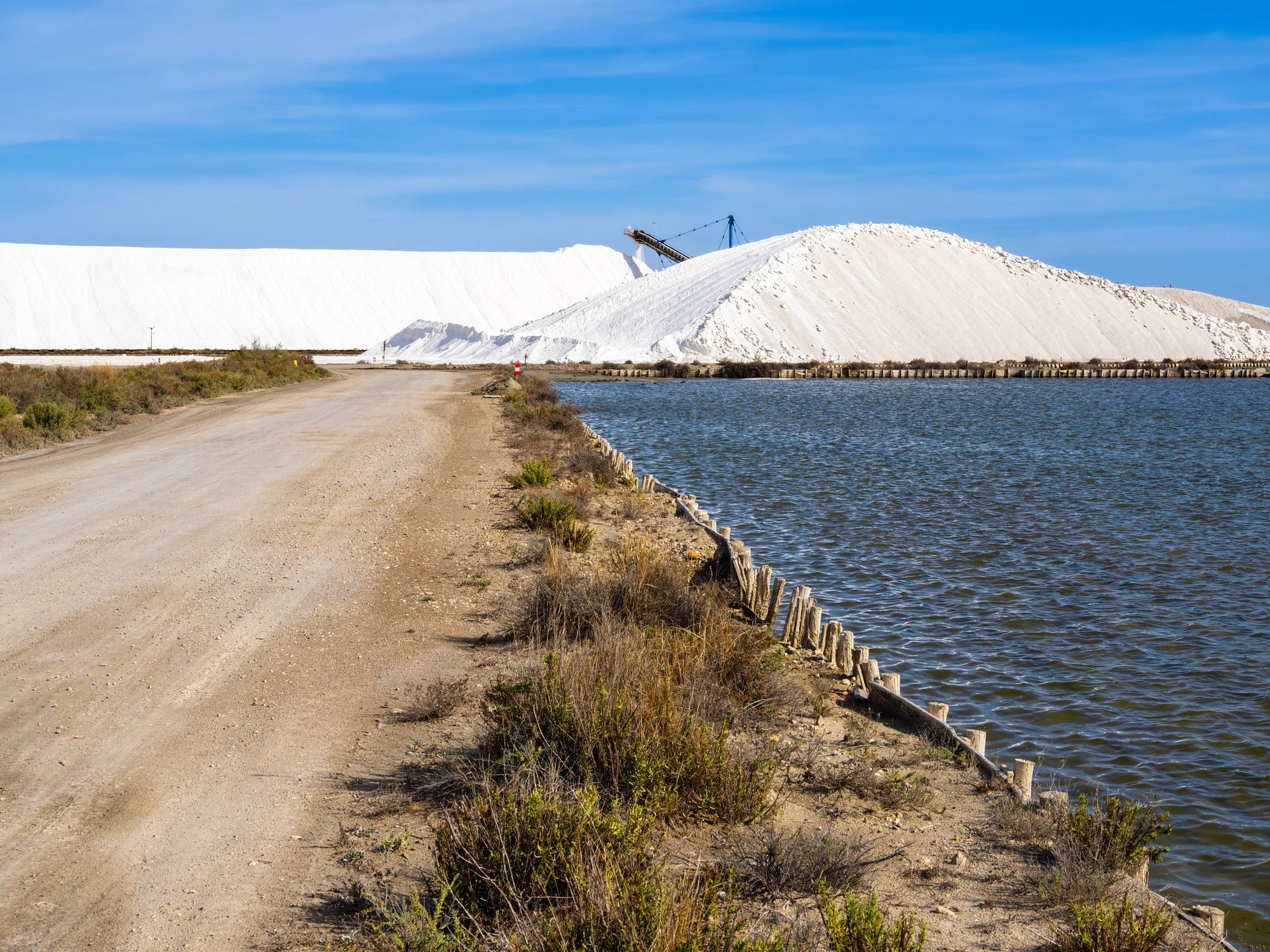 Salt piles and conveyor at the salt pans in Aigues-Mortes, France